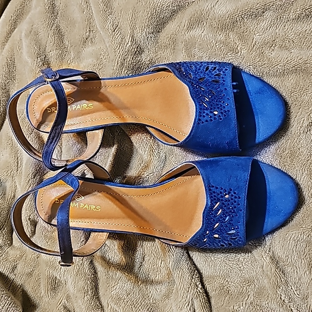 Blue suede heels with embellishment